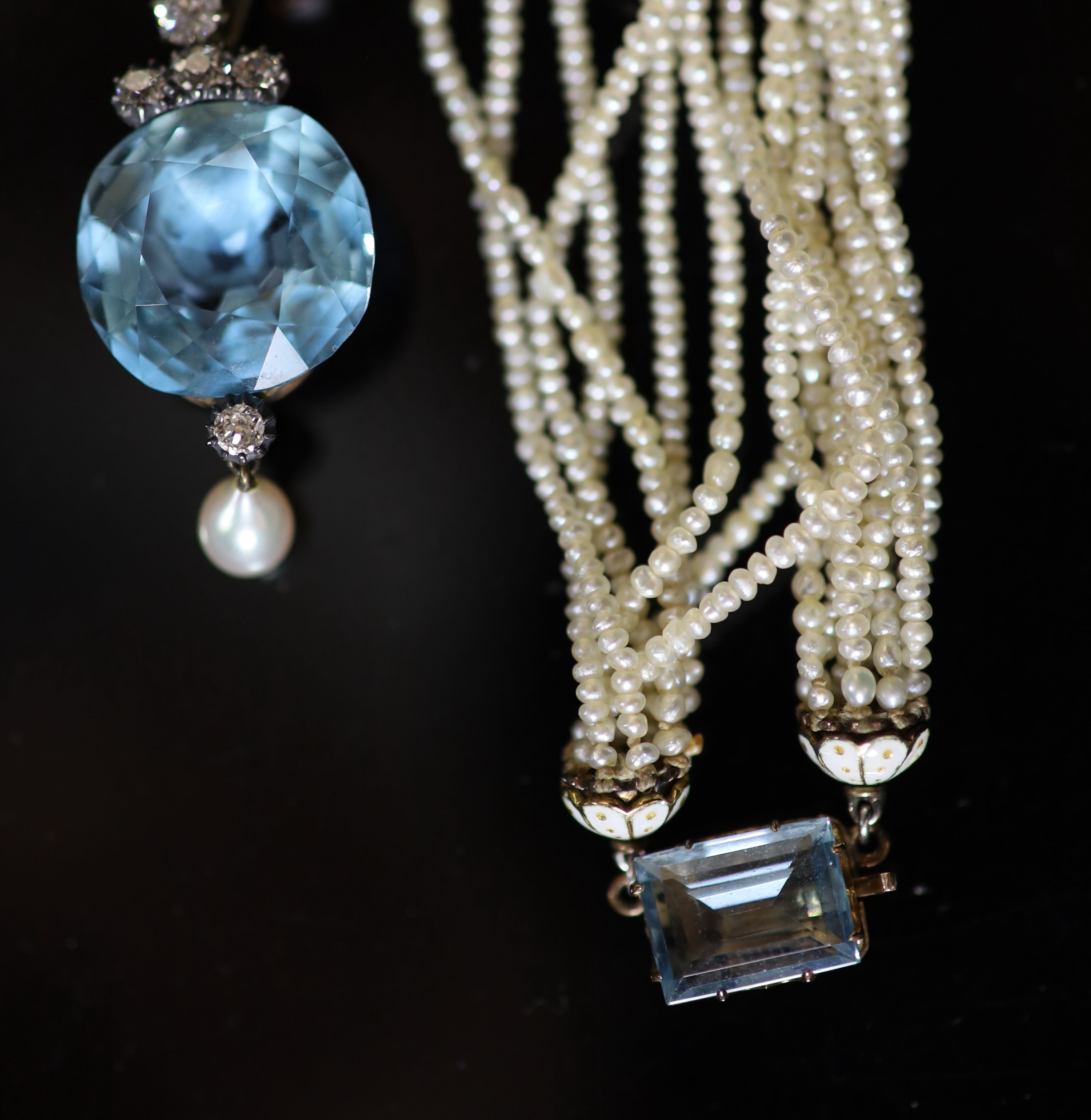 A 19th century gold and silver, aquamarine, diamond, pearl and enamel set multi strand seed pearl drop necklace